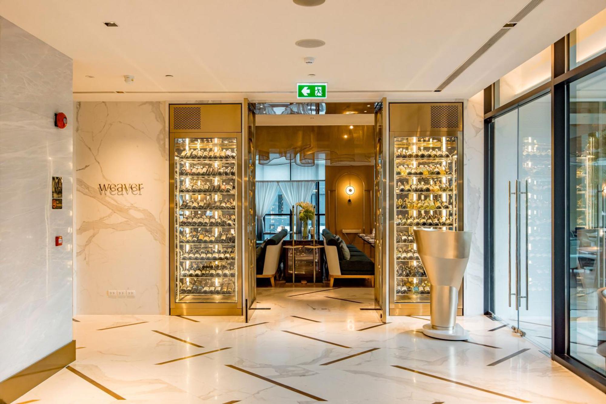 Silq Hotel & Residence, Managed By The Ascott Limited Banguecoque Exterior foto Entrance to the restaurant
